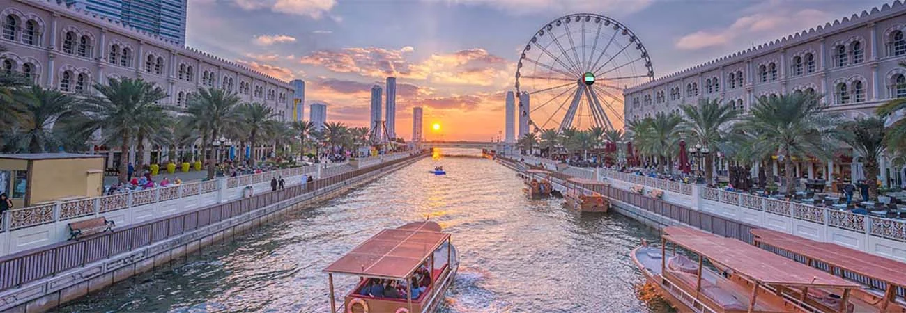 Eye of the Emirates - ferris wheel in Al Qasba - Shajah at sunset